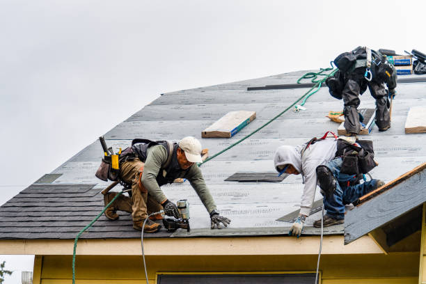 Professional Roof Replacement technician working in Saugatuck, CT